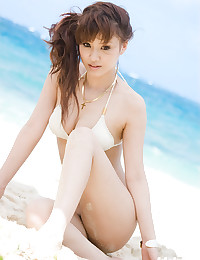 Tantilizing Asian Beauty At The Beach