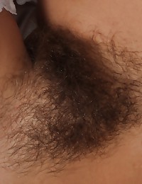 With a single finger sliding into her hairy pussy, Susane quivers in delight as it curls upwards to hit the right spots. Sucking her finger after wards reminds her of past enjoyment
