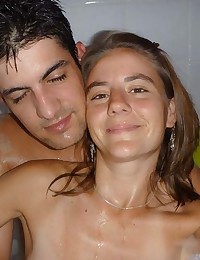 Hot Latina couple showering and self-shooting naked together