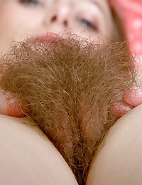 Beautifully hairy Sasha shows you her love for her thick bush in her bedroom. What a beautiful, natural girl.