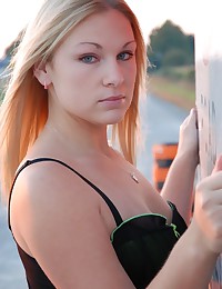 Nikkis Playmates - She models on the road outdoors in sensual lingerie