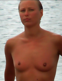 Naked shaved girl at beach