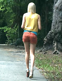 We were riding through the Grove and from afar we see this hot blonde, Tara Lee, walking and talking to some peacocks that were chilling beside her.