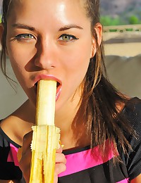 Sexy brunette gets naughty with a big banana.