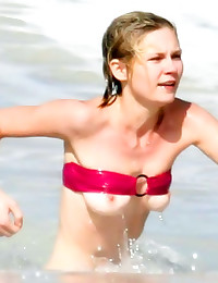 Kirsten Dunst beach nipple sl...