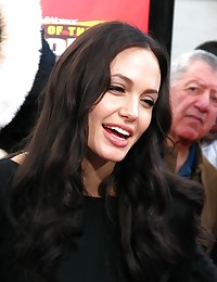 Pictures of Angelina Jolie wearing a very hot sexy black dress